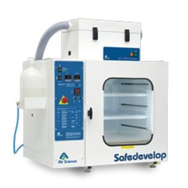 A 2023 Safedevelop lab vent hood features a transparent front door, control panel on the left, air exhaust hose on top, and multiple shelves inside. This modern design is supported by grants from the Bellevue Police Foundation.